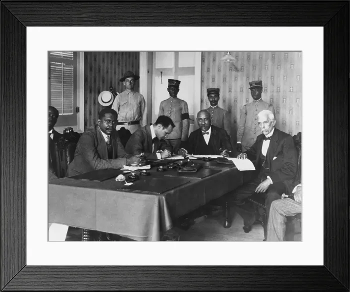 Framed Print : President Philippe Sudre Dartiguenave, seated, 2nd from left, with cabinet ministers, Nov. 1915. In the left background, stands his bodyguard, US Marine Sergeant H.E. Miller Framed Print : President Philippe Sudre Dartiguenave, seated, 2nd from left, with cabinet ministers, Nov. 1915. In the left background, stands his bodyguard, US Marine Sergeant H.E. Miller