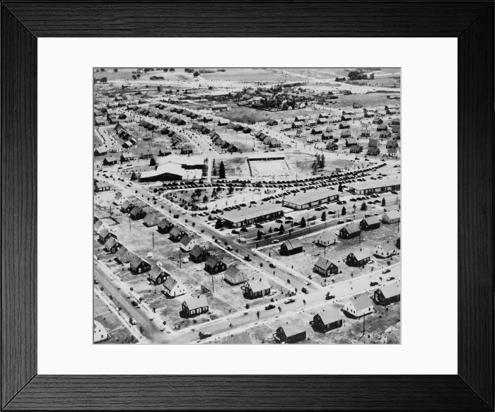 Framed Print : Aerial view of Levittown New York in 1953. Levittown was named after William Levitt the builder of the planned suburban community on Long Island New York. Ca. 1950