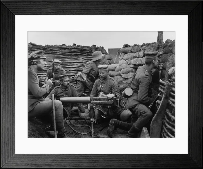 Framed Print : German WW1 soldiers with machine gun 40 meters from the British trenches. 1916. A soldier with the metal helmet is ready to throw a hand grenade (BSLOC_2012_4_126)