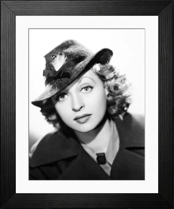 Framed Print : GOOD MORNING, BOYS, Lilli Palmer, in a smart sports hat in brown brushed felt with a stitched brim, 1937