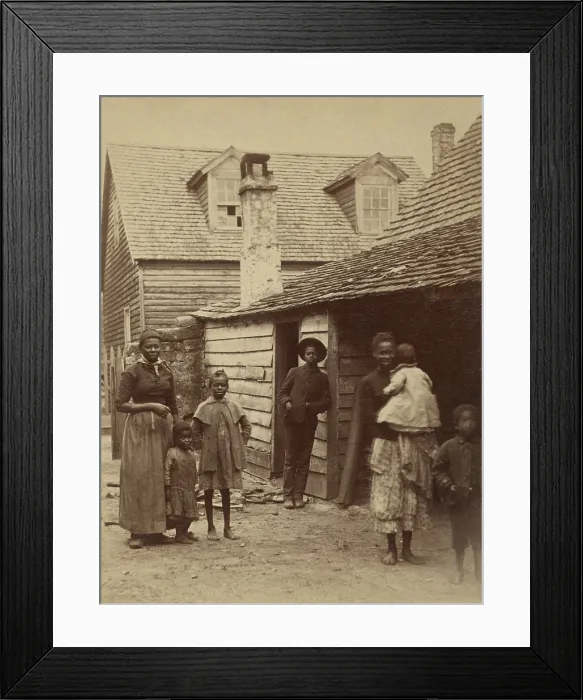 Framed Print : Portrait of an African American family standing in front of a house, St. Augustine, Florida, 1886. Photo by George Barker (BSLOC_2017_20_124)