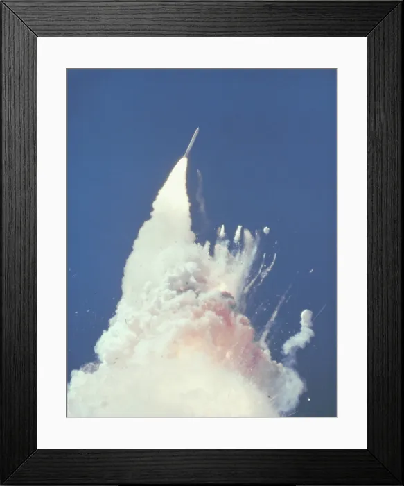Framed Print : Space shuttle Challenger disaster. 76 seconds into flight, reddish-brown cloud envelops the disintegrating shuttle Framed Print : Space shuttle Challenger disaster. 76 seconds into flight, reddish-brown cloud envelops the disintegrating shuttle