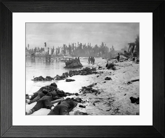 Framed Print : Sprawled bodies on beach of Tarawa Island, Gilbert Islands. In the U.S. invasion 990 U.S. Marines were killed, while 5000 Japanese defenders died, with only 17 surrendering. Nov