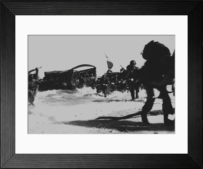 Framed Print : U.S. troops hit the beach from Higgins boats during the invasion of Japanese held Wadke Island, Dutch New Guinea. May 18, 1944 (BSLOC_2013-12_184) Framed Print : U.S. troops hit the beach from Higgins boats during the invasion of Japanese held Wadke Island, Dutch New Guinea. May 18, 1944 (BSLOC_2013-12_184)