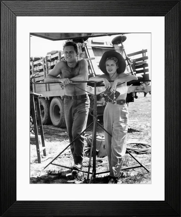 Framed Print : STREETS OF LAREDO, from left: William Holden, Mona Freeman, on set, 1949 Framed Print : STREETS OF LAREDO, from left: William Holden, Mona Freeman, on set, 1949