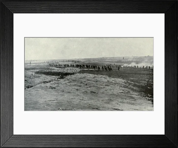 Framed Print : Russian WW1 soldiers deserting first line trenches in July 1917. A regiment has evacuated its first line, rushing back through the reserve wire, to the vacant second line Framed Print : Russian WW1 soldiers deserting first line trenches in July 1917. A regiment has evacuated its first line, rushing back through the reserve wire, to the vacant second line