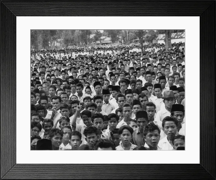Framed Print : Indonesians in an anti-Sukarno rally in Batu Sankar, Sumatra. They protested President Sukarno's consolidation of dictatorial powers. 1958 Framed Print : Indonesians in an anti-Sukarno rally in Batu Sankar, Sumatra. They protested President Sukarno's consolidation of dictatorial powers. 1958