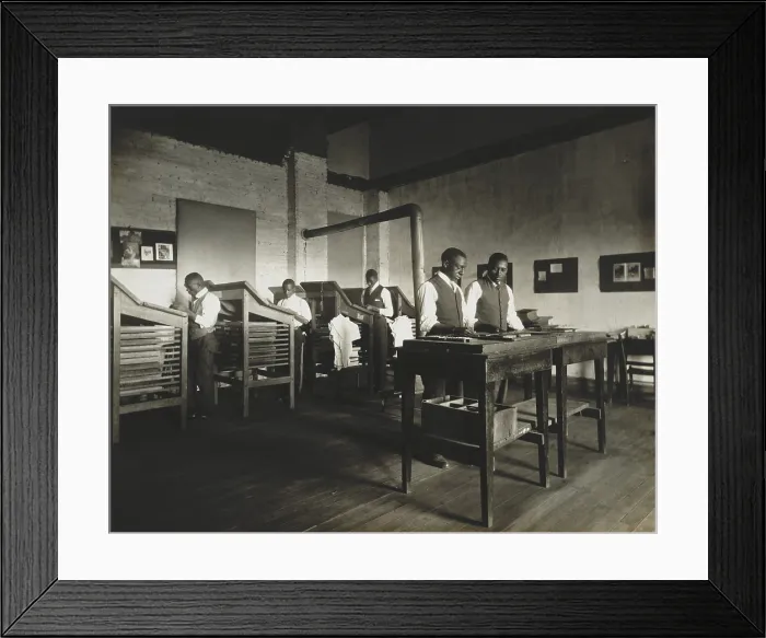 Framed Print : African Americans working as printing typesetters, at Tuskegee Institute, c. 1910-25. The college stressed practical occupational skills