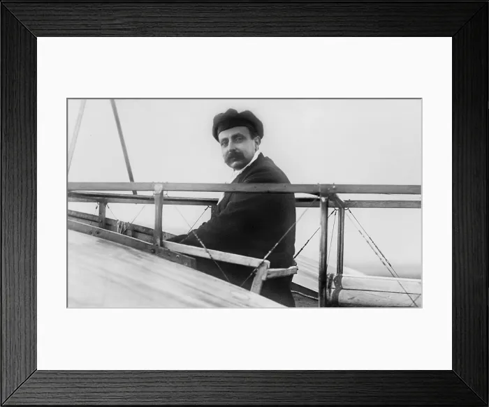 Framed Print : Louis Bleriot in his monoplane, c. 1910-1925. The French inventor and flyer built the first successful monoplane and founded an aircraft manufacturing company (BSLOC_2018_2_137)