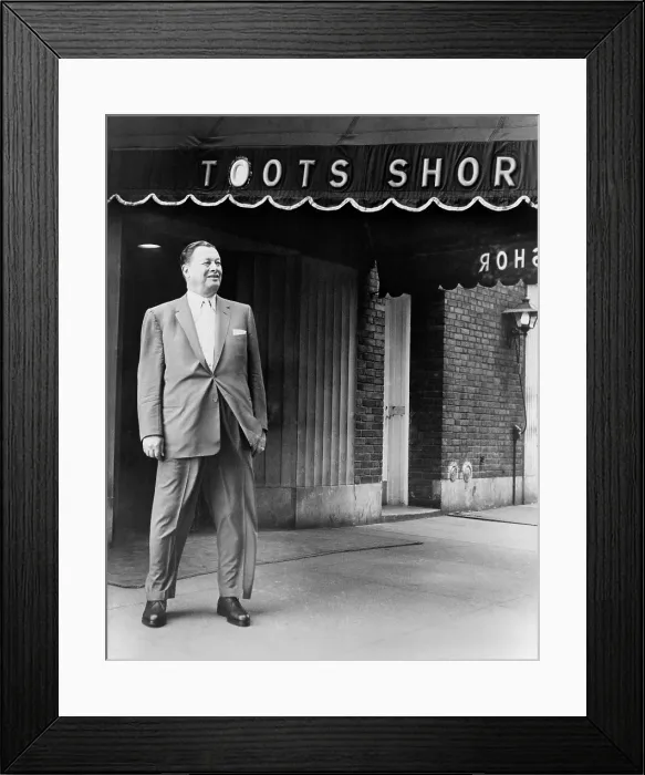 Framed Print : Toots Shor in front of his famous restaurant in 1959. His restaurant was patronized by New York's biggest celebrities in the 1940s and 1950s Framed Print : Toots Shor in front of his famous restaurant in 1959. His restaurant was patronized by New York's biggest celebrities in the 1940s and 1950s