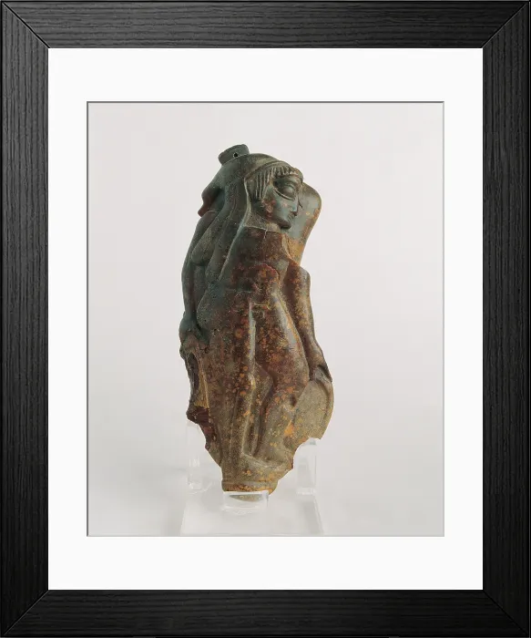 Framed Print : Amber pendant with figure of a warrior, by Unknown Artist, Unknown creation date - Italy, Basilicata, Potenza, Melfi, National Museum. All