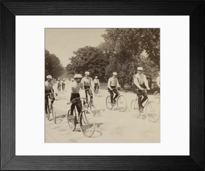 Framed Print : Ten young men riding bicycles in New York Citys Central Park, 1895. Their identical costumes suggest they are members of a cycling club (BSLOC_2018_2_175)