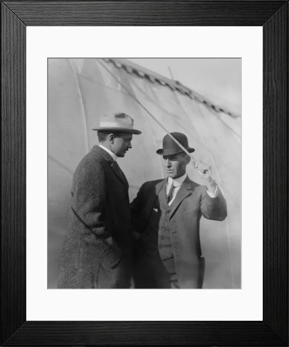 Framed Print : Allen Ryan and Wilbur Wright in discussion, c. 1909-1912. Ryan was chairman of the Committee for the GREAT AERIAL TOURNAMENT at Belmont Park, in Oct. 1910 (BSLOC_2018_2_156)