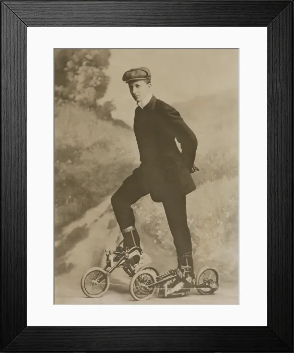 Framed Print : Studio portrait of a young man on Edvard Petrinis pedaled roller skates, known as Takypod in Sweden, c. 1910