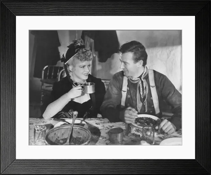 Framed Print : STAGECOACH, from left: Claire Trevor, John Wayne, 1939