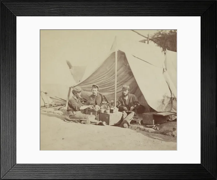 Framed Print : US Civil War, 1862. Three enlisted men of the 22nd New York State Militia near Harpers Ferry, Virginia, have a meal in a camp tent (BSLOC_2018_8_184)