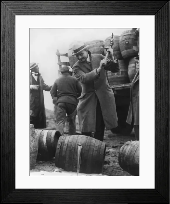 Framed Print : Beer flows into the Schuylkill River in Philadelphia, as beer kegs are destroyed by an ax, 1924