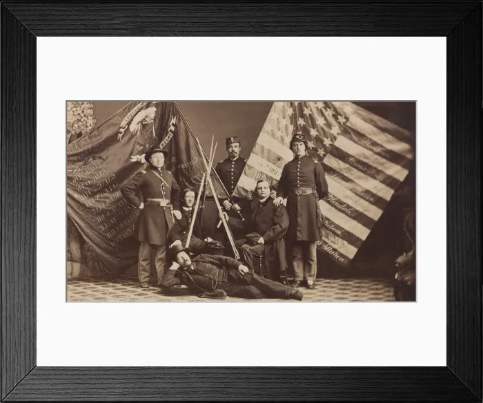 Framed Print : US Civil War, 1861-1865. Soldiers of the 63rd New York Infantry Regiment pose in uniform with federal and state battle flags and a rifle stack