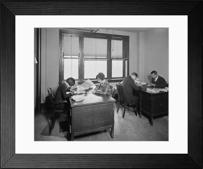 Framed Print : Researchers at the National Bureau of Identification, which became part of the FBI in 1924. Men and women examining fingerprints with magnifying loupes (BSLOC_2016_10_69)