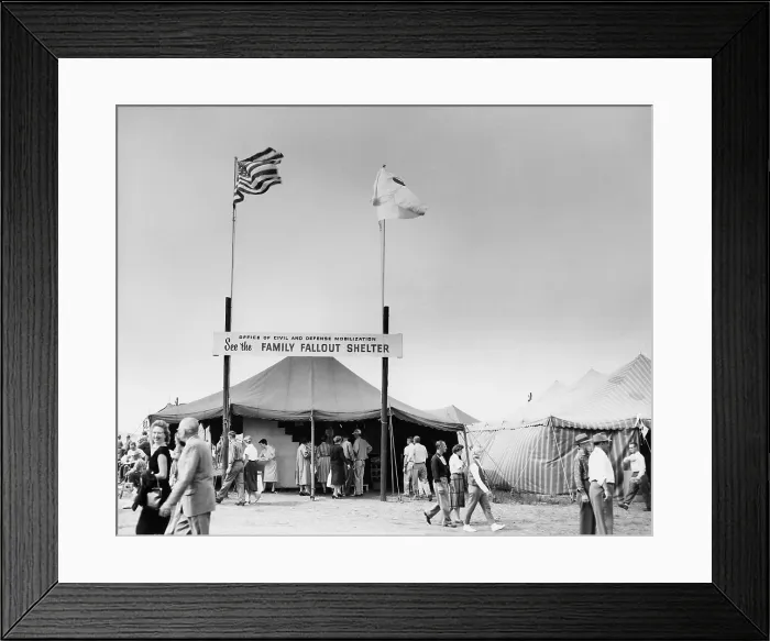 Framed Print : Fallout shelters promoted at a county fair. The US Government Office of Civil and Defense Mobilization displayed a model concrete block shelter for home basements. Early 1960s Framed Print : Fallout shelters promoted at a county fair. The US Government Office of Civil and Defense Mobilization displayed a model concrete block shelter for home basements. Early 1960s
