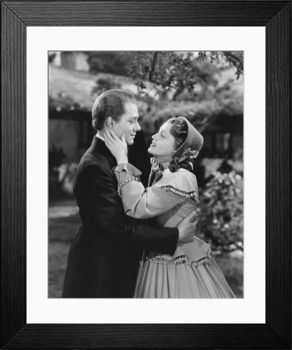 Framed Print : THE GIRL OF THE GOLDEN WEST, from left: Nelson Eddy, Jeanette Macdonald, 1938