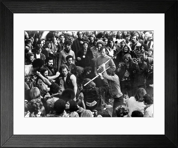 Framed Print : GIMME SHELTER, Hell's Angels beating an audience member at Altamont, 1970