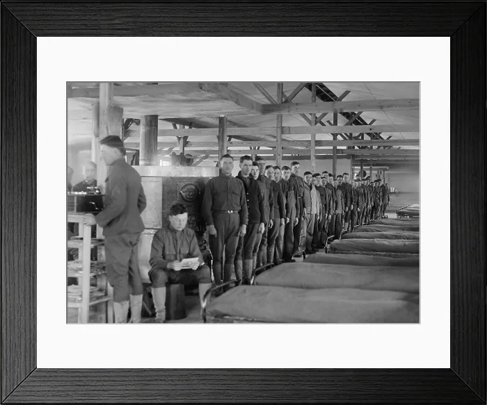 Framed Print : Soldiers stand in a row by their beds in the barracks at Camp Mead, Maryland, Dec. 1917. (BSLOC_2016_13_105.jpg )
