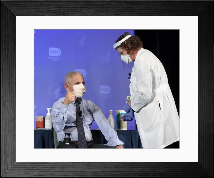 Framed Print : Dr. Anthony Fauci, gives the thumbs up sign after publicly receiving the Moderna COVID-19 vaccine, Dec. 22, 2020 (BSLOC_2021_1_19)