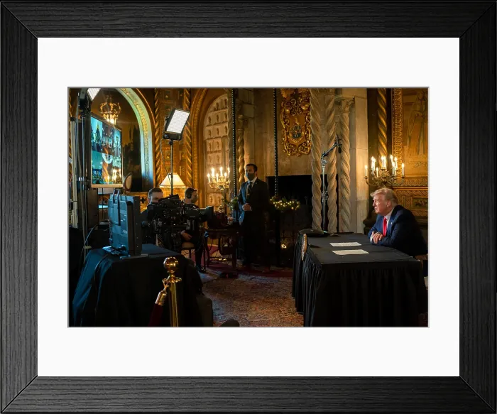 Framed Print : President Donald Trump makes a Christmas Day video teleconference call to on duty military from the Mar-a-Lago mansion in Palm Beach, Florida, Dec. 25, 2020 (BSLOC_2021_1_6)