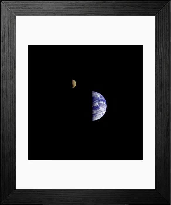Framed Print : Earth and Moon in a single photographic frame. The images was taken by Voyager 1 when it was 7.25 million miles from Earth. Sept. 18, 1977 Framed Print : Earth and Moon in a single photographic frame. The images was taken by Voyager 1 when it was 7.25 million miles from Earth. Sept. 18, 1977