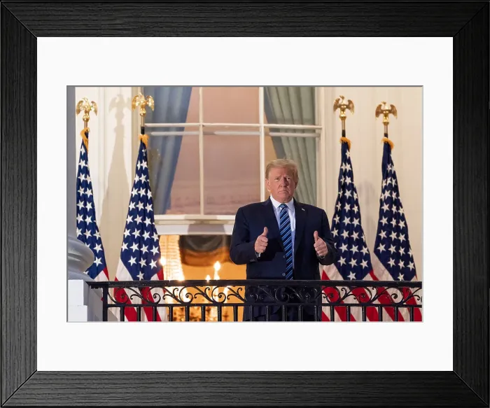 Framed Print : President Donald Trump gestures thumbs up to supporters after his discharge from Walter Reed hospital on Oct. 5, 2020