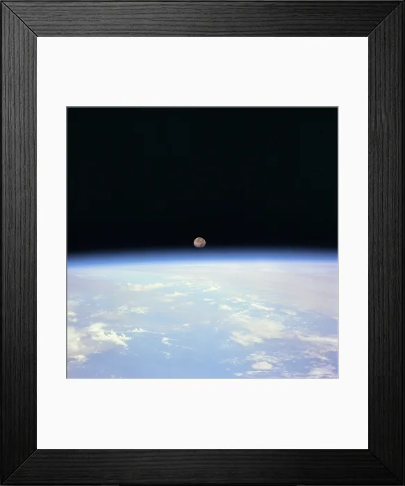 Framed Print : Moon set and Earth horizon taken from Space Shuttle Discovery. July 14, 1995 Framed Print : Moon set and Earth horizon taken from Space Shuttle Discovery. July 14, 1995