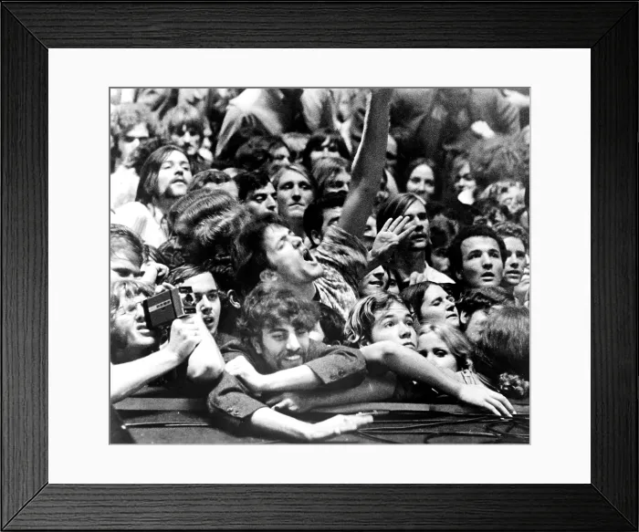Framed Print : GIMME SHELTER, fans in the audience watching the Rolling Stones concert at Altamont Speedway, in December 1969. Documentary was released in 1970