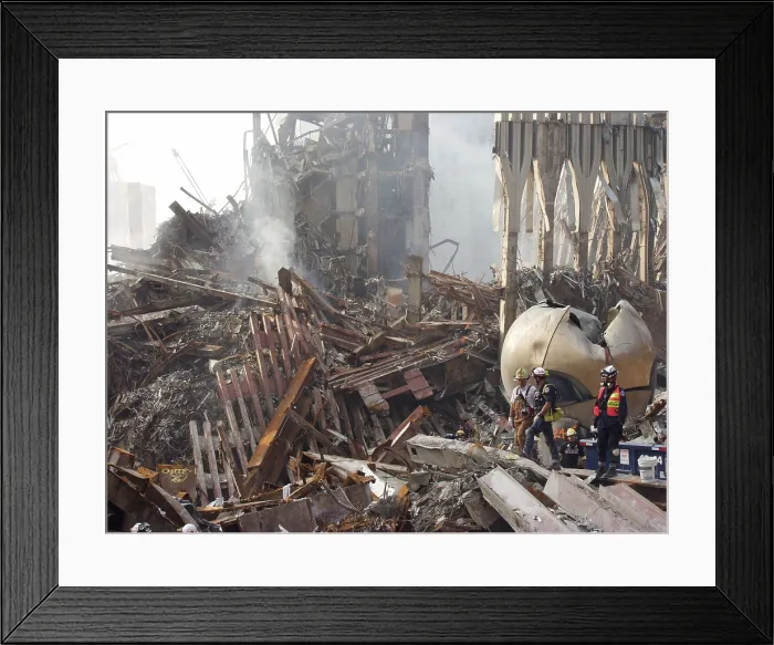 Framed Print : The smoking remains of the World Trade Center with the still erect lower facade and THE SPHERE a sculpture from the WTC outdoor public space, September 21, 2001 Framed Print : The smoking remains of the World Trade Center with the still erect lower facade and THE SPHERE a sculpture from the WTC outdoor public space, September 21, 2001