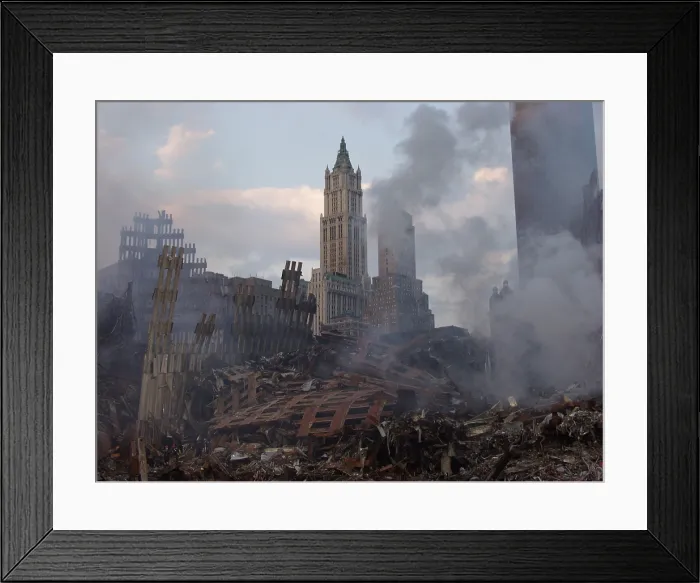 Framed Print : The classic skyscraper the Woolworth Building is seen through smoking remains of the World Trade Center 10 days after the terrorist attacks. Sept. 21 2001 Framed Print : The classic skyscraper the Woolworth Building is seen through smoking remains of the World Trade Center 10 days after the terrorist attacks. Sept. 21 2001