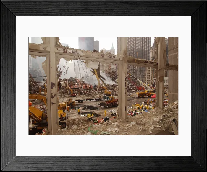 Framed Print : World Trade Center recovery operations as seen from the blown out windows of the World Financial Center. September 20, 2001. Photo: Everett Collection