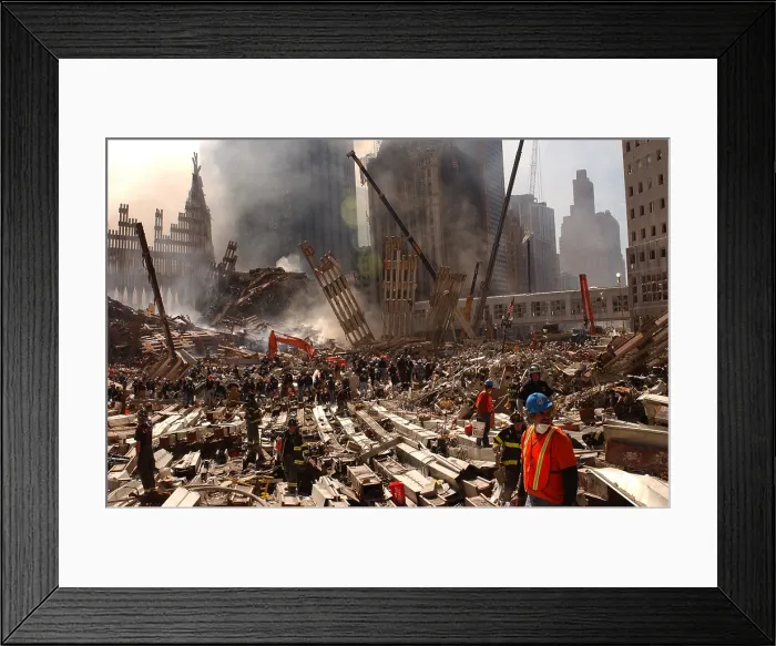 Framed Print : Rescue workers and firefighters in the wreckage at the World Trade Center two days after the 9-11 terrorist attacks on Spt. 13 2001. View toward the Southwest area of WTC site