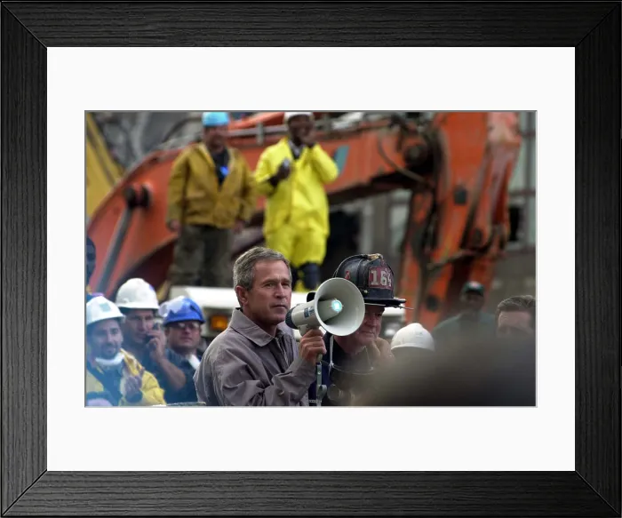 Framed Print : President Bush addresses rescue workers with a bullhorn at the site of the World Trade Center disaster two days after the 9-11 terrorist attacks. Sept. 13 2001