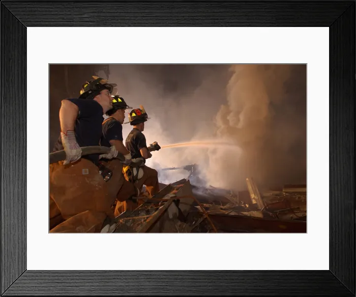 Framed Print : New York firefighters continue to battle blazes at Ground Zero eight days after the 9-11 terrorist attacks. Sept. 19 2001. Photo: Everett Collection
