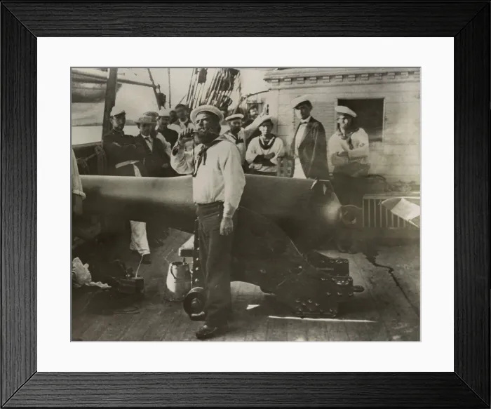 Framed Print : US Civil War. Boatswain piping near a large cannon on deck of a Union warship, 1861-65 Framed Print : US Civil War. Boatswain piping near a large cannon on deck of a Union warship, 1861-65