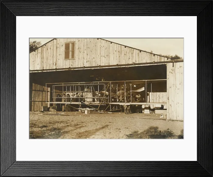 Framed Print : Wright Brothers airplane in its hanger on Governors Island in Sept. 1909. Piloted by Wilbur, their plane made three flights over New York harbor on Sept. 29, 1909 Framed Print : Wright Brothers airplane in its hanger on Governors Island in Sept. 1909. Piloted by Wilbur, their plane made three flights over New York harbor on Sept. 29, 1909