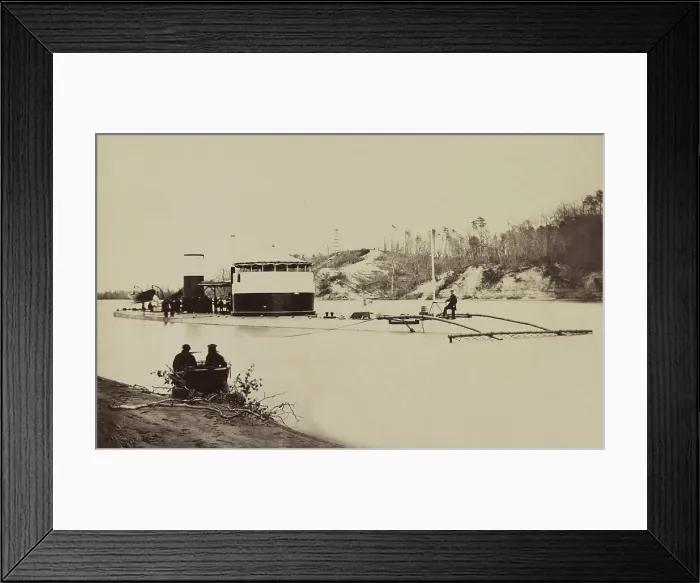 Framed Print : US Civil War, Union Canonicus class on the James River, Virginia, 1864. She is equipped with a minesweeping rake, to locate torpedoes, as mines were called at the time