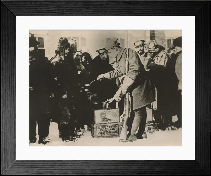 Framed Print : American soldier ladling out soup to Russian POWs in Archangelsk, Russia, during World War 1 Framed Print : American soldier ladling out soup to Russian POWs in Archangelsk, Russia, during World War 1