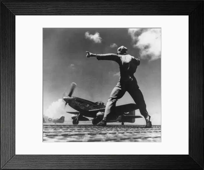Framed Print : Airman gives the take off signal to North American P-51 nicknamed My Girl on Iwo Jima. In the Bonin Islands, World War 2. April-August, 1945. (BSLOC_2014_6_31)