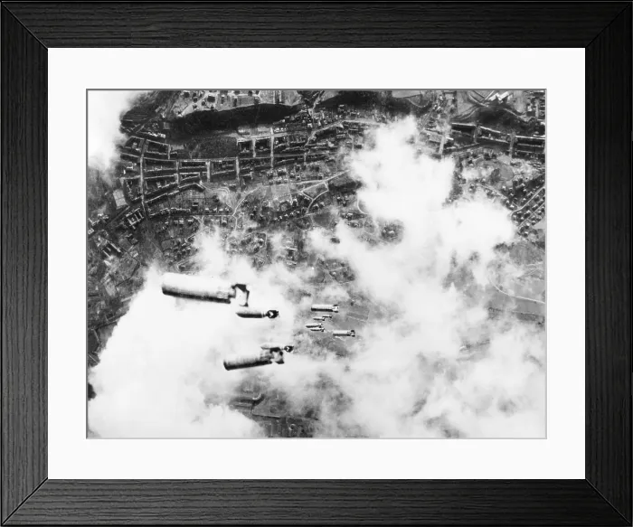 Framed Print : Incendiary bombs fall toward the city of Dresden, Germany. U.S. 8th Air Force heavy bombers attacked the Saxony capital following the Royal Air Force night bombings. U.S Framed Print : Incendiary bombs fall toward the city of Dresden, Germany. U.S. 8th Air Force heavy bombers attacked the Saxony capital following the Royal Air Force night bombings. U.S