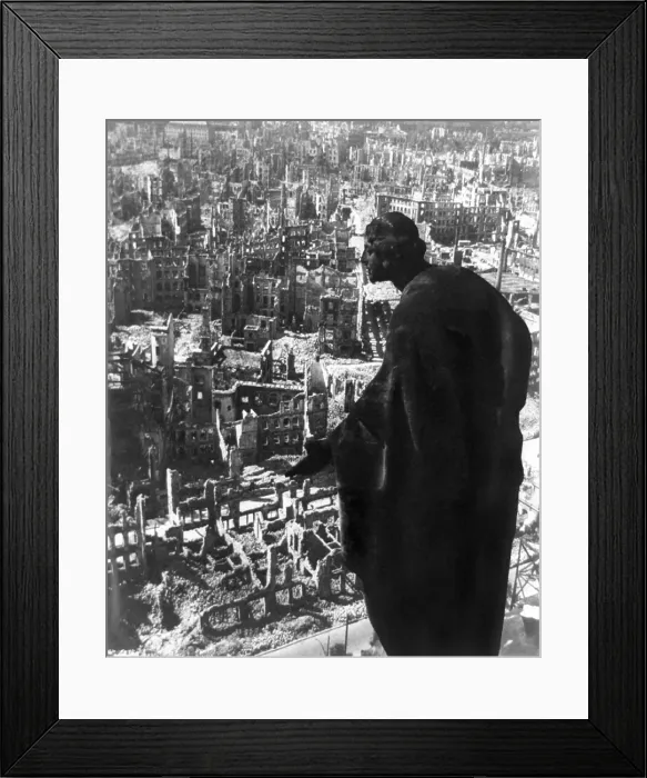 Framed Print : Statue overlooking Dresden, Germany, after fire bombing during World War 2. View of the destroyed city from the city hall (Rathaus) Framed Print : Statue overlooking Dresden, Germany, after fire bombing during World War 2. View of the destroyed city from the city hall (Rathaus)