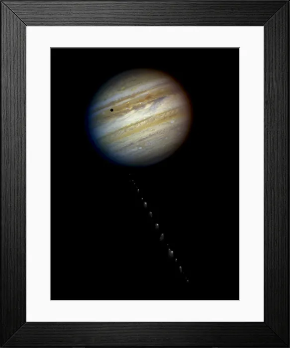 Framed Print : Comet P / Shoemaker-Levy 9 approaching Jupiter on May 17, 1994. The comet's train of 21 icy fragments stretched across 710 thousand miles