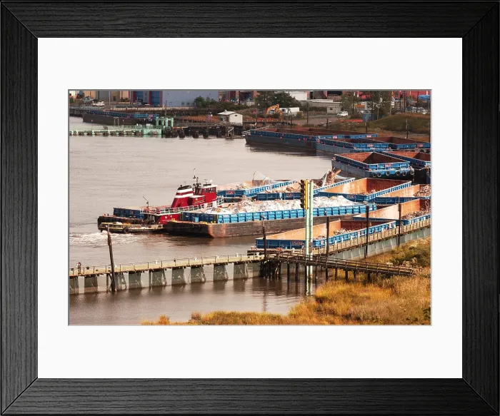 Framed Print : Debris from the World Trade Center arrives by barge at the landfill on Staten Island