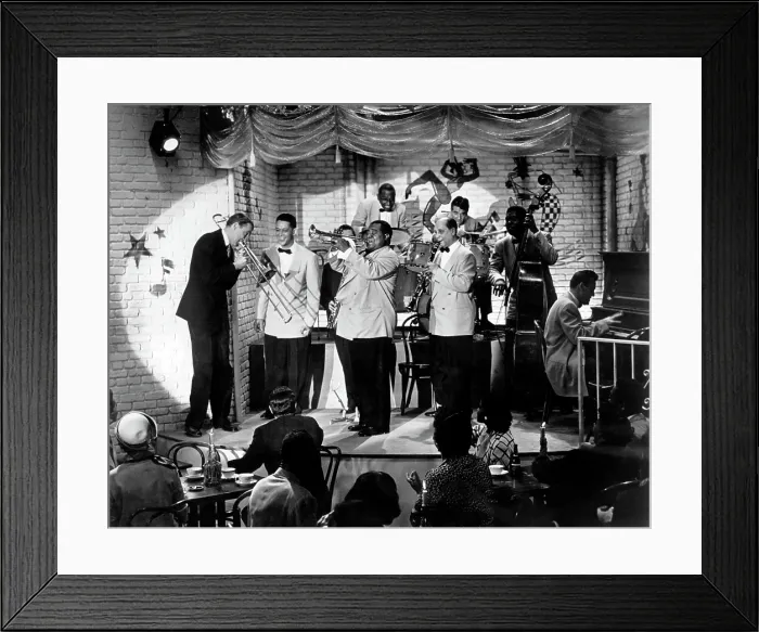 Framed Print : THE GLENN MILLER STORY, James Stewart, Louis Armstrong, Barney Bigard (clarinet player), Gene Krupa (drummer, right), 1954 Framed Print : THE GLENN MILLER STORY, James Stewart, Louis Armstrong, Barney Bigard (clarinet player), Gene Krupa (drummer, right), 1954