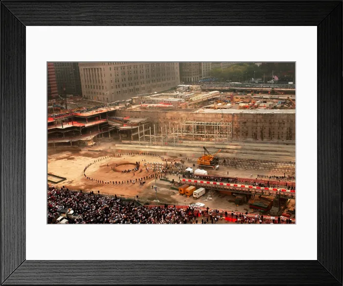 Framed Print : First Anniversary of the 9-11 terrorist attacks in New York City on September 11 2002 took place is the excavated World Trade Center site. Photo: Everett Collection